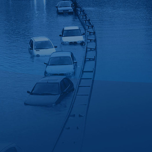 Flooded area where cars are parked, due to a hurricane.