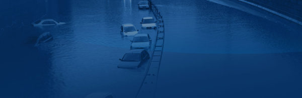 Flooded area where cars are parked, due to a hurricane.